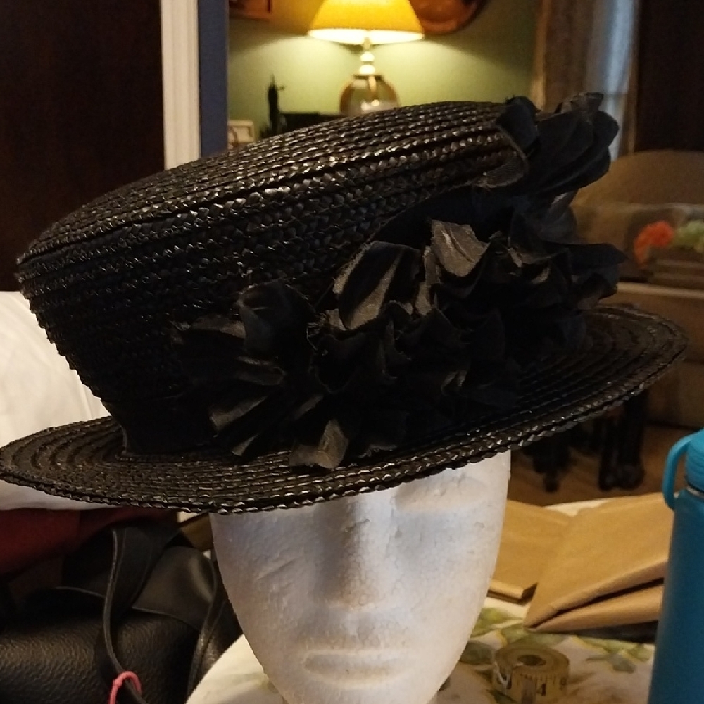 Elegant Black Straw Hat with Floral Accent